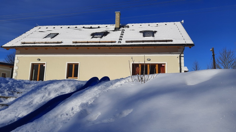 View of the cottage in winter